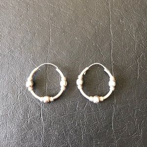 Genuine silver hoops